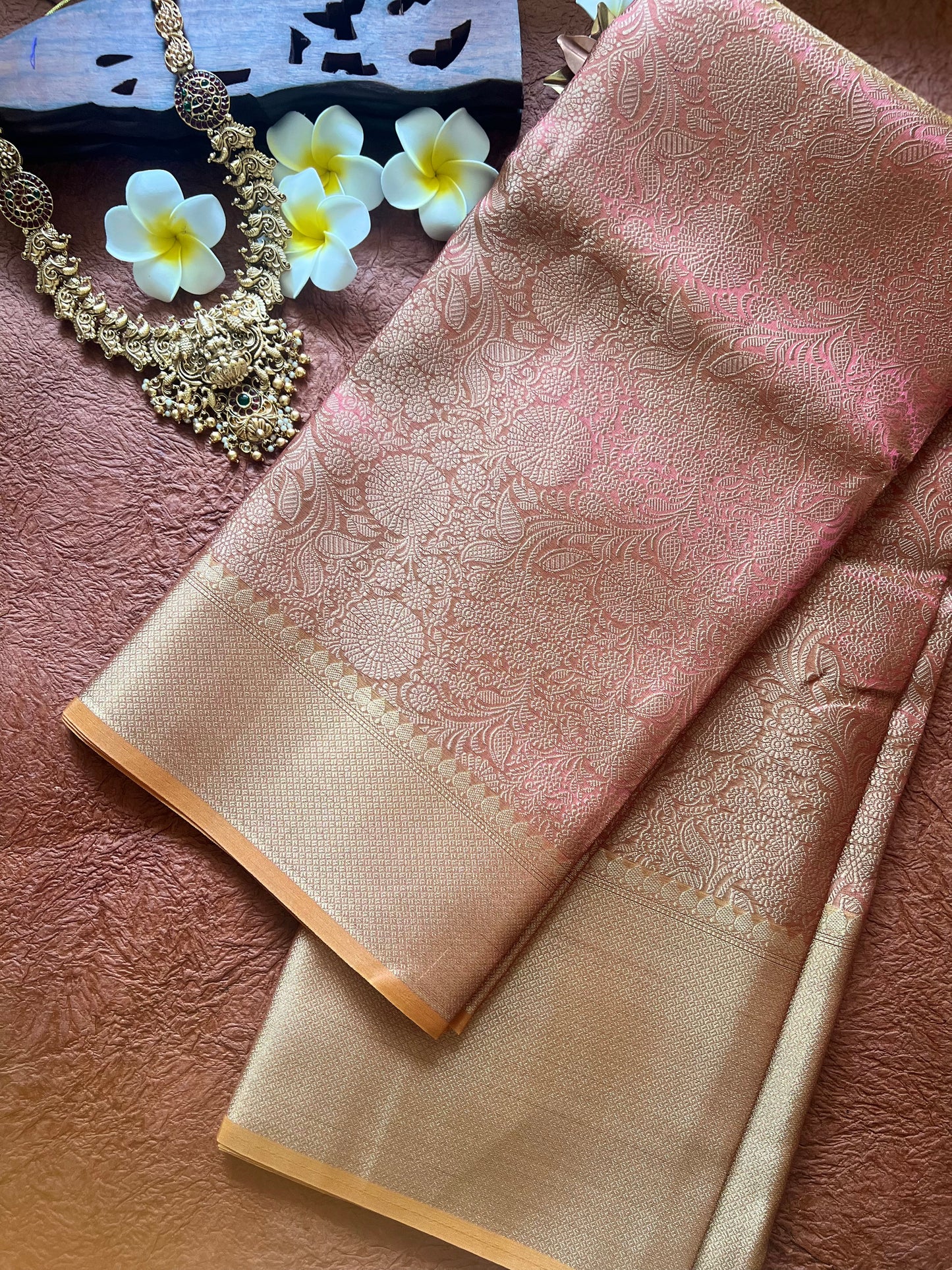 Elegant Peach Tissue Silk Saree – Sheer Grace in Every Fold